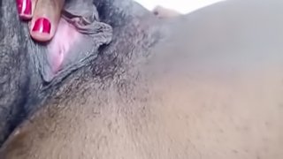 Rubbing herself to orgasm up close and personal