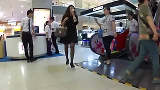 Chinese dude cum on girl skirt in the department store