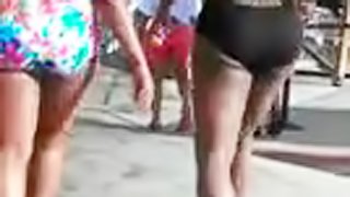Two amateur girls wearing swimsuits get caught on a hidden cam