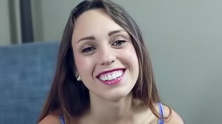 Joyously smiling girl sucks on a big cock erotically