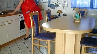 Granny fisted and banged on a kitchen table